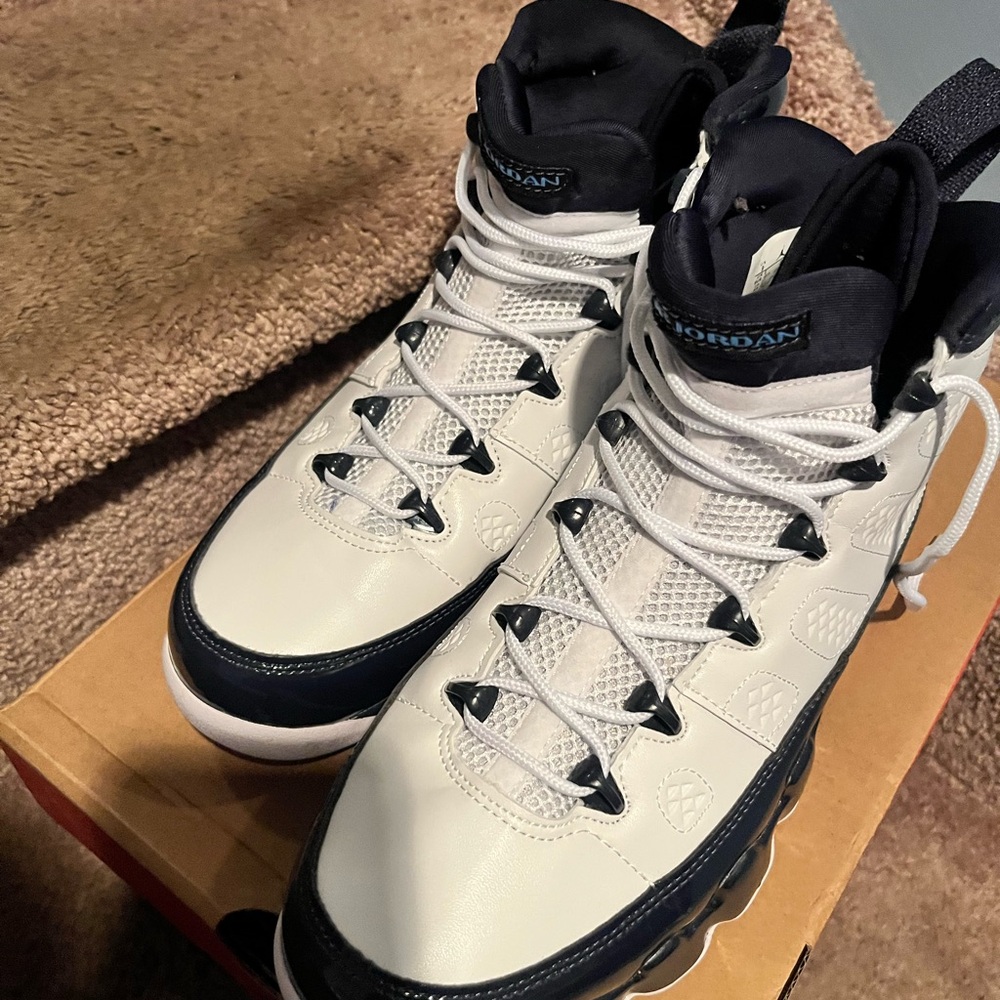 Preowned size 9 Jordan High-Top Sneakers in White and Blue. Belong to my son!